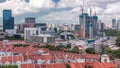 Aerial view of Chinatown with red roofs and Central Business District skyscrapers timelapse, Singapore Royalty Free Stock Photo