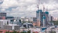 Aerial view of Chinatown with red roofs and Central Business District skyscrapers timelapse, Singapore Royalty Free Stock Photo