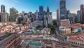 Aerial view of Chinatown with red roofs and Central Business District skyscrapers timelapse, Singapore Royalty Free Stock Photo