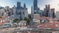 Aerial view of Chinatown with red roofs and Central Business District skyscrapers timelapse, Singapore Royalty Free Stock Photo