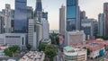 Aerial view of Chinatown with red roofs and Central Business District skyscrapers timelapse, Singapore Royalty Free Stock Photo