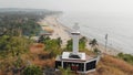 Aerial view christian cross on a hill in Arambol, India.