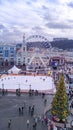 Aerial view of Christmas market Kyiv, Ukraine. Ferris wheel, ice rink, Christmas tree and decoration at Kontraktova square