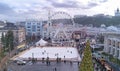 Aerial view of Christmas market Kyiv, Ukraine. Ferris wheel, ice rink, Christmas tree and decoration at Kontraktova square