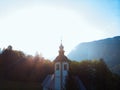 Aerial view of the church on Bohinj lake. Travel and tours concept. Beautiful landscape ot the Triglav mountains, national park, Royalty Free Stock Photo