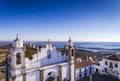 Aerial view of a church facade in the historic village of Monsaraz in Alentejo with the Alqueva dam reservoir on the background