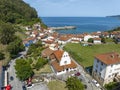 Aerial view Church of Iglesia San Miguel in Tazones Asturias Spain