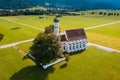 Aerial view of church near Schwangau with Alps in background