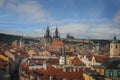 Aerial view of Church of Our Lady before Tyn and Old Town Hall tower with Prague Castle on background - Prague, Czech Republic Royalty Free Stock Photo