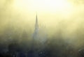 Aerial view of church steeple wreathed in morning fog in autumn, Waitsfield, VT Royalty Free Stock Photo