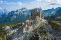 Aerial view of Cinque Torri in Dolomites mountains in Italy. Epic landscape on a sunny day of summer