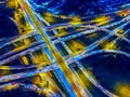 Aerial view of Circle Road traffic in roundabout and highway at night. Expressway, Modern transportation, Multilevel junction Royalty Free Stock Photo