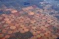 Aerial view of circular irrigated fields.