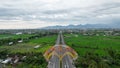 Aerial view of the city colorful Monument Tembolak Rainbow and Mataram City metro monument. The newest icon from the city of