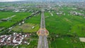 Aerial view of the city colorful Monument Tembolak Rainbow and Mataram City metro monument. The newest icon from the city of