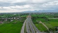 Aerial view of the city colorful Monument Tembolak Rainbow and Mataram City metro monument. The newest icon from the city of