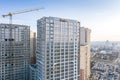 Aerial view of city construction site with crane and buildings Royalty Free Stock Photo