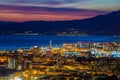 Aerial view of the city of Genoa at dusk, Italy. Royalty Free Stock Photo