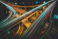 Aerial view of a city highway interchange at night. Multiple intersecting roads Royalty Free Stock Photo