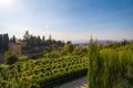 Aerial view of the city with historic center of Granada with some part of Alcazaba castle and Sierra Nevada on background Royalty Free Stock Photo