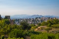 Aerial view of the city with historic center of Granada with some part of Alcazaba castle and Sierra Nevada on background Royalty Free Stock Photo