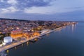 Aerial view of the city of Lisbon and the 25 of April Bridge on the background at dusk; Royalty Free Stock Photo