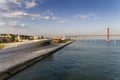 Aerial view of the city of Lisbon with the Tagus River and the 25 of April Bridge on the background; Royalty Free Stock Photo