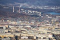 Aerial view of the city of Magadan. Top view of the streets and buildings Royalty Free Stock Photo