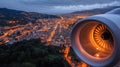 Aerial View of City at Night from Airplane Window with Engine Close-Up Royalty Free Stock Photo