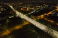 Aerial view on city night lights. Lamp illumination and car lights game Royalty Free Stock Photo