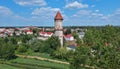 Aerial view on city, old town, water pressure tower, green city. Royalty Free Stock Photo