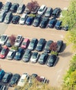 Aerial view of city parking with rows of cars