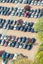 Aerial view of city parking with rows of cars