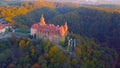 Aerial view of a city in Poland - north of the country - a castle in the middle of the forest - overlooking the trees and beautifu
