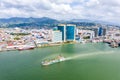 Aerial view of city of Port of Spain, the capital city of Trinidad and Tobago. Skyscrapers of the downtown and a busy sea port Royalty Free Stock Photo