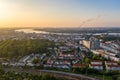 Aerial view of the city of rostock, railway tracks, river warnow and power plant chimney in the background