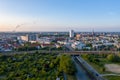 Aerial view of the city of rostock, railway tracks, river warnow and power plant chimney in the background