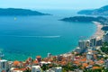 aerial view of the city on the seashore and mountains, panorama of the resorts of Becici and Budva in Montenegro, Adriatic sea,