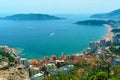 aerial view of the city on the seashore and mountains, panorama of the resorts of Becici and Budva in Montenegro, Adriatic sea,