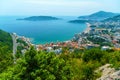 aerial view of the city on the seashore and mountains, panorama of the resorts of Becici and Budva in Montenegro, Adriatic sea,