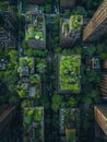 Aerial view on a city with tall buildings with green spaces on roofs. Urban concrete jungle, highlighting environmental