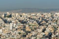 Aerial view of cityscape with crowded buildings of Athens in a sunny day in Greece Royalty Free Stock Photo