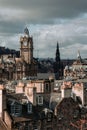 Aerial view of a cityscape of Edinburgh, Scotland on a cloudy day