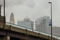 Aerial view of cityscape Kansas surrounded by buildings in foggy day