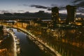 Aerial view of cityscape of Klaipeda at night. Yachts and boats docked along the embarkment of Dane river. Nightlife of Klaipeda,