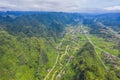 Aerial view of cityscape and nature with green fields and mountains in Chi Lang, Lang Son, Vietnam Royalty Free Stock Photo