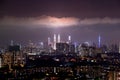 Aerial view of the cityscape at night with a cloudy sky in the background, Kuala Lumpur, Malaysia Royalty Free Stock Photo