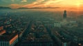 Aerial view of a cityscape at sunset with haze over the skyline and mountains in the background Royalty Free Stock Photo