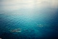 Aerial view of clear ocean water, calm waves on a sunny day. Concept tranquill background Royalty Free Stock Photo