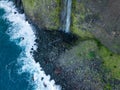 Aerial view of the cliffside and Corrego da Furna waterfall. Madeira, Portugal